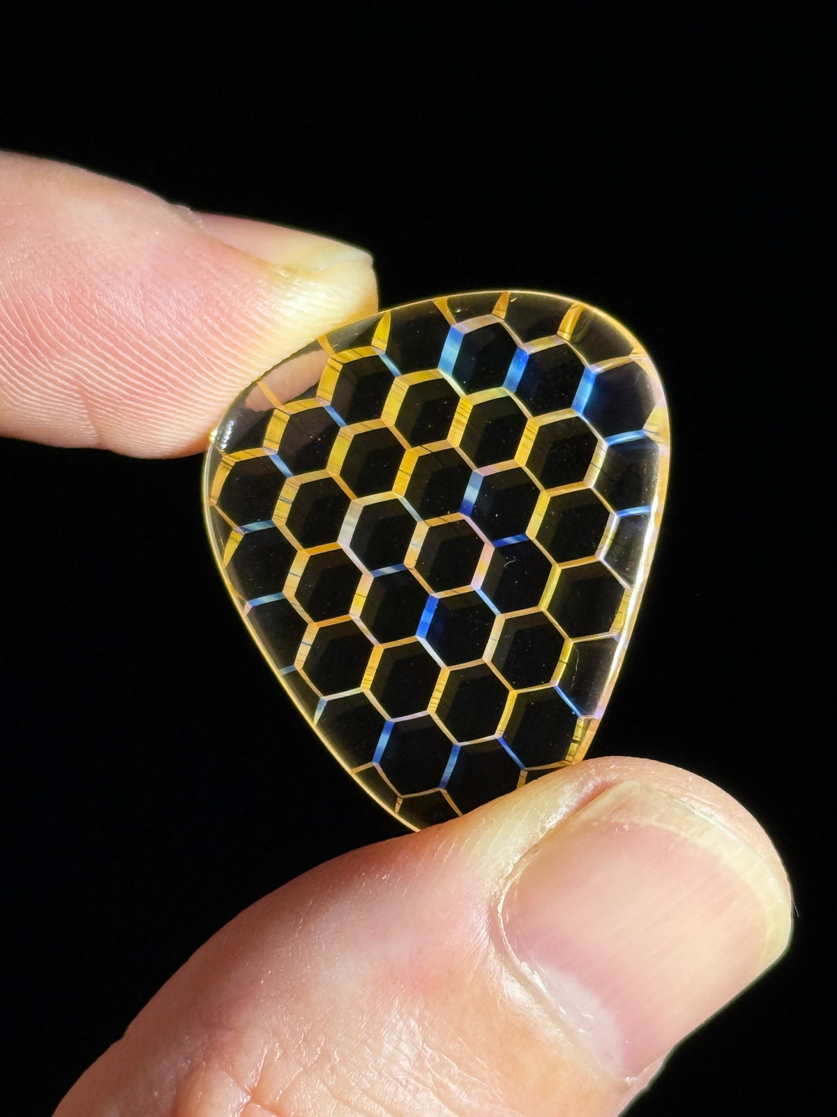 Honeycomb glass guitar pick by Ryan Teurfs
